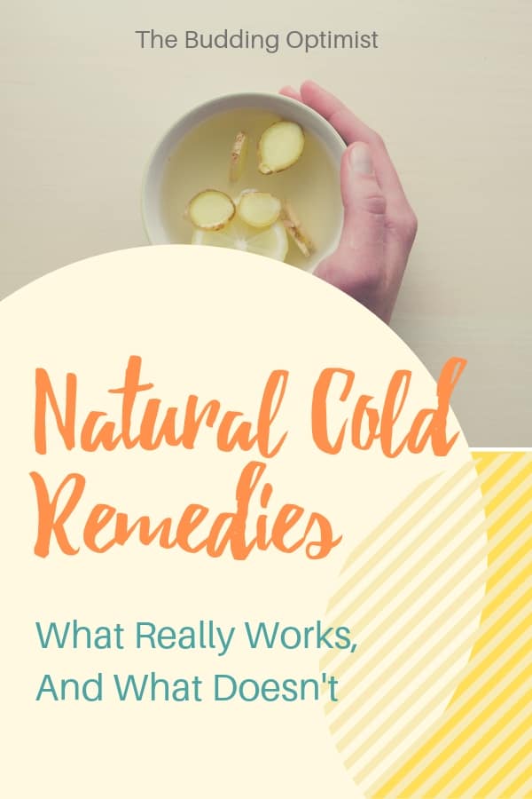 Natural Cold Remedies Pinterest image - hand holding a ginger lemon tea