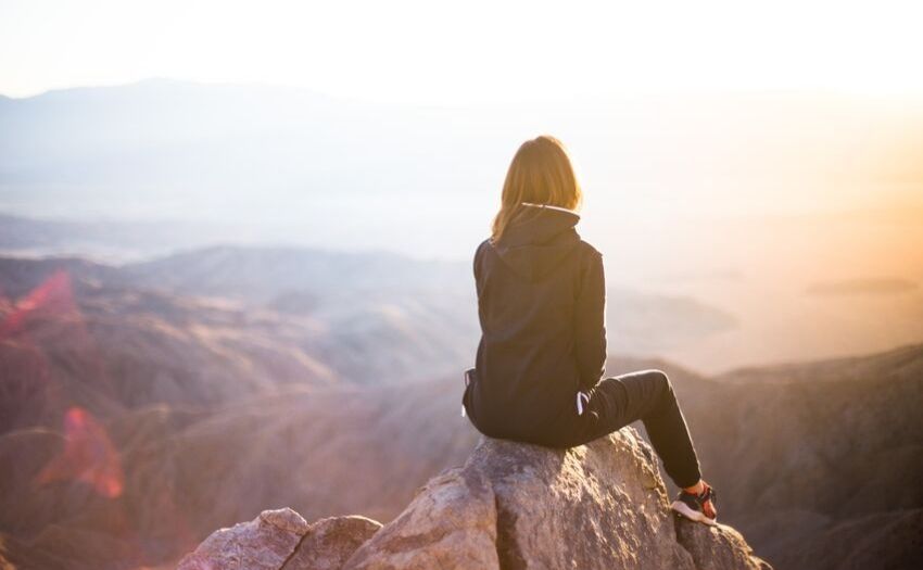 Apps That Make You Happy - girl looking at mountains afar
