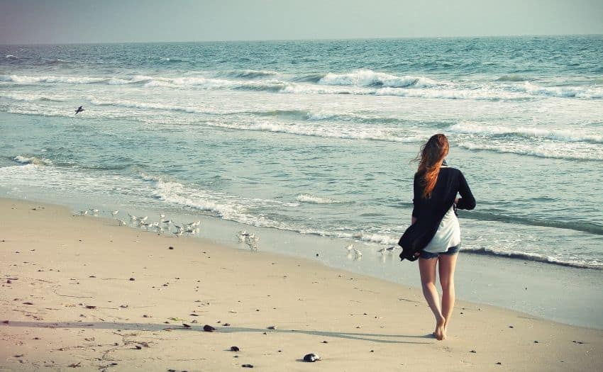 woman walking on a beach