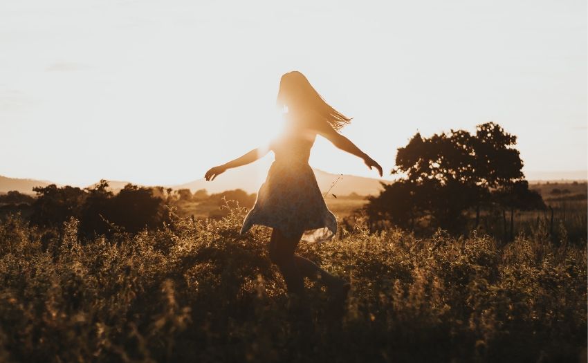 Lessons I learned i n life woman dancing in the sun