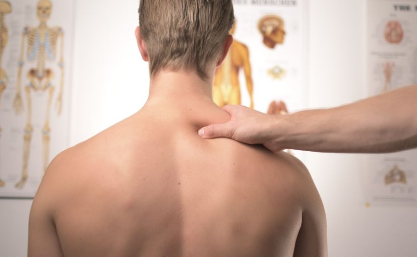 acupressure points for cold feature image man receiving massage treatment
