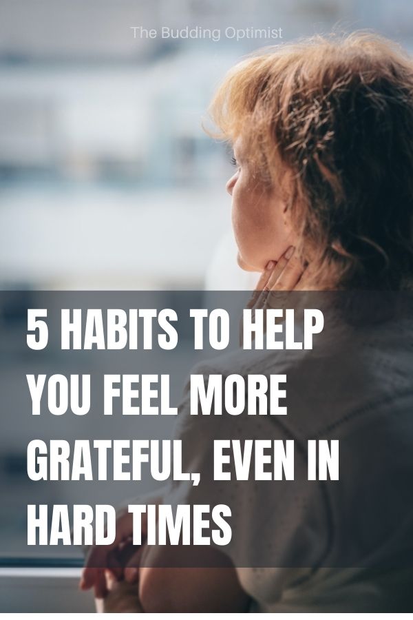 How to be grateful in hard times Pinterest image of a girl looking far ahead